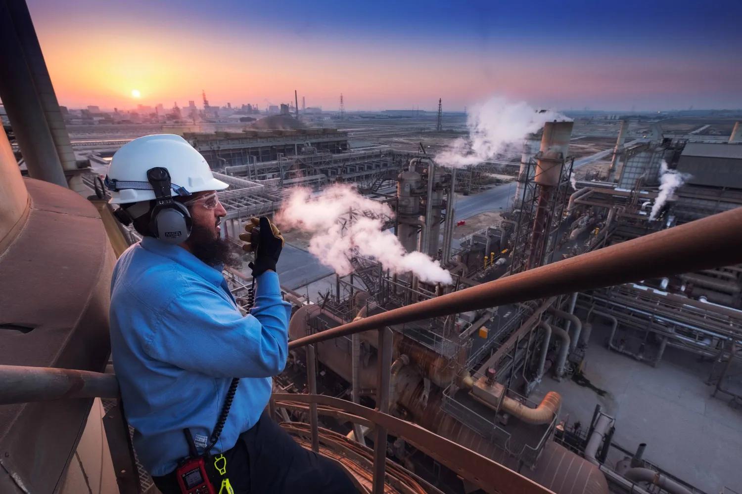Industrial energy complex and port infrastructure at sunset